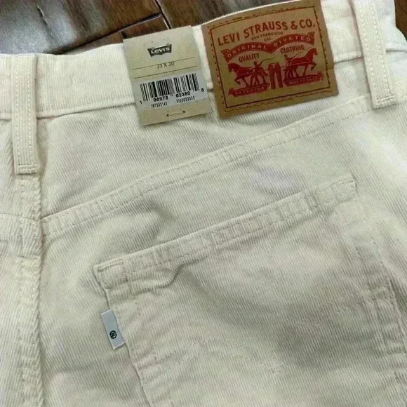 Levi’s women 725 HIGH RISE BOOTCUT size 33/30 BNWT corduroy ivory jeans - Picture 1 of 9